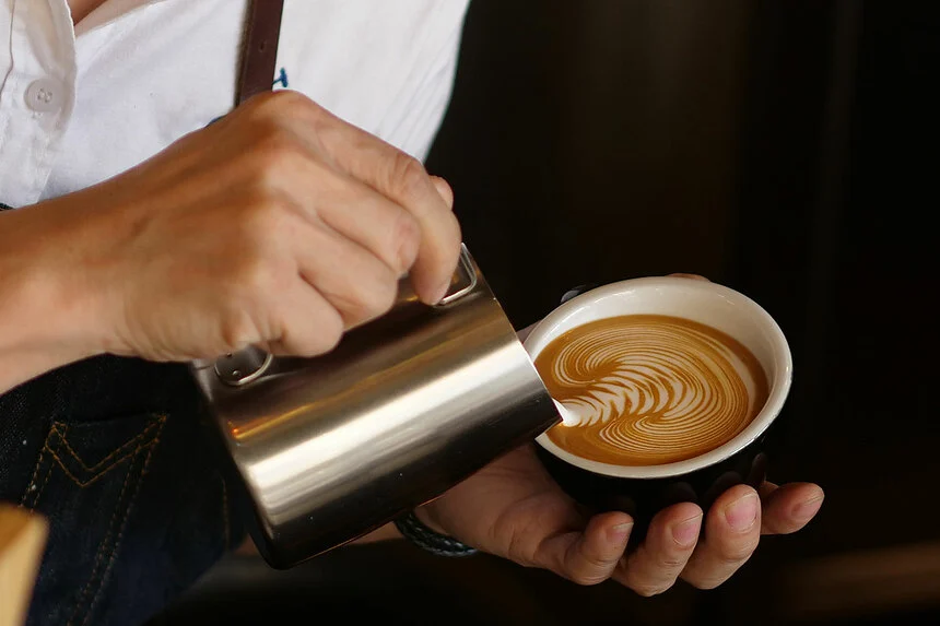 Barista making coffee